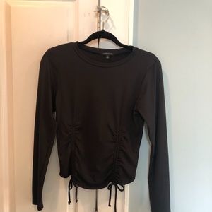 black long sleeved gathered slightly crop t